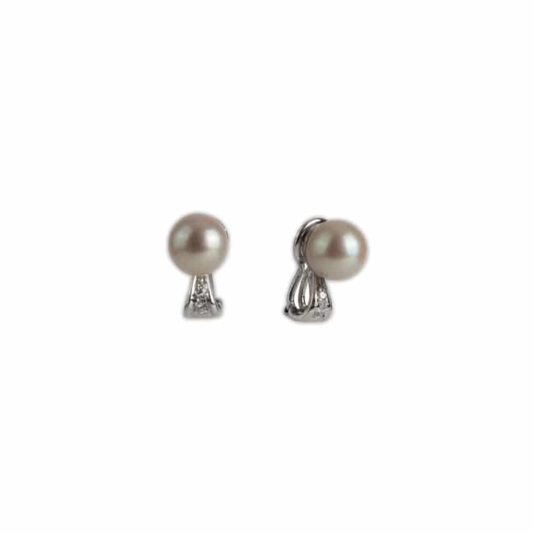 Bijoux Vintage - Boucles d’oreilles clips vintage en or blanc ornés de 2 perles et 4 diamants