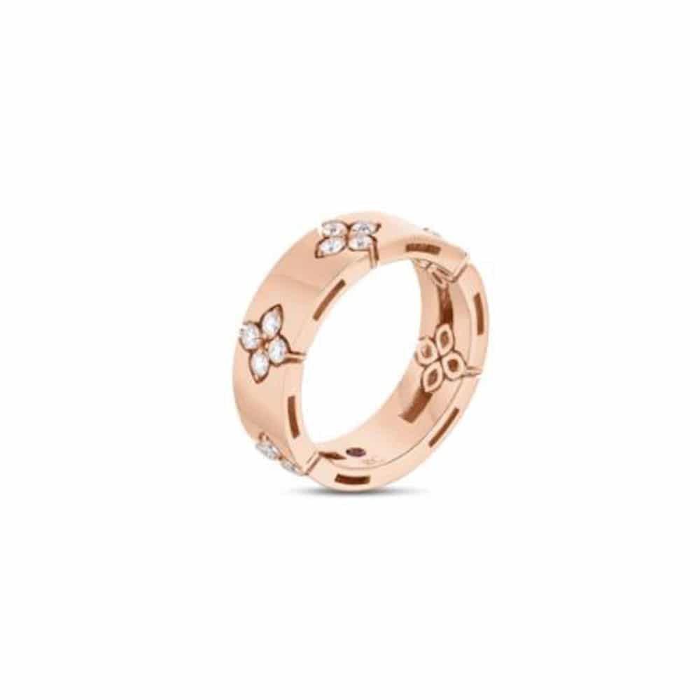 Bague en or rose 750 sertie de 20 diamants et un rubis