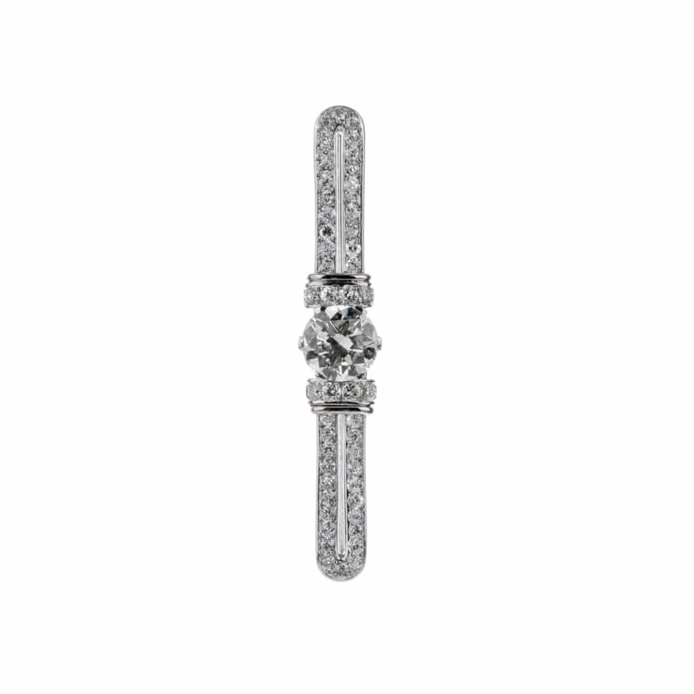 Broche or blanc et platine un diamant central entouré de diamants