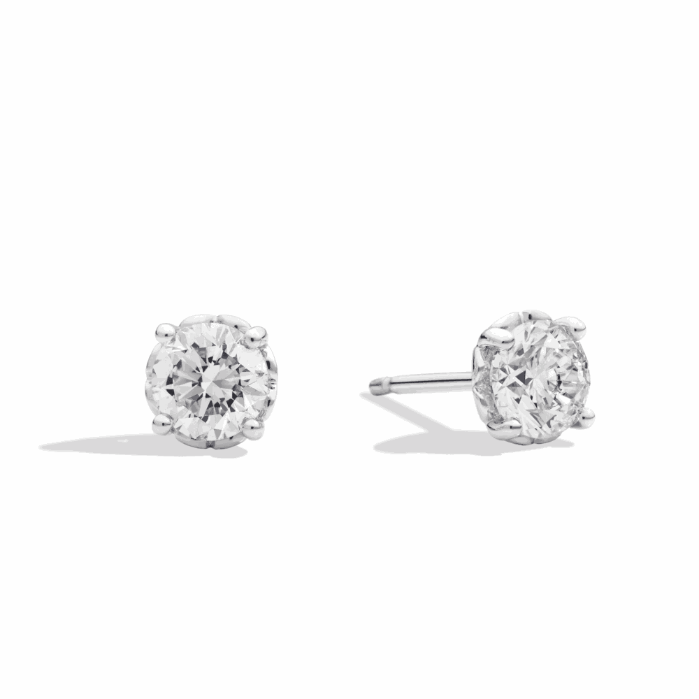 Earrings in white gold set with two diamonds totalling 0.20ct