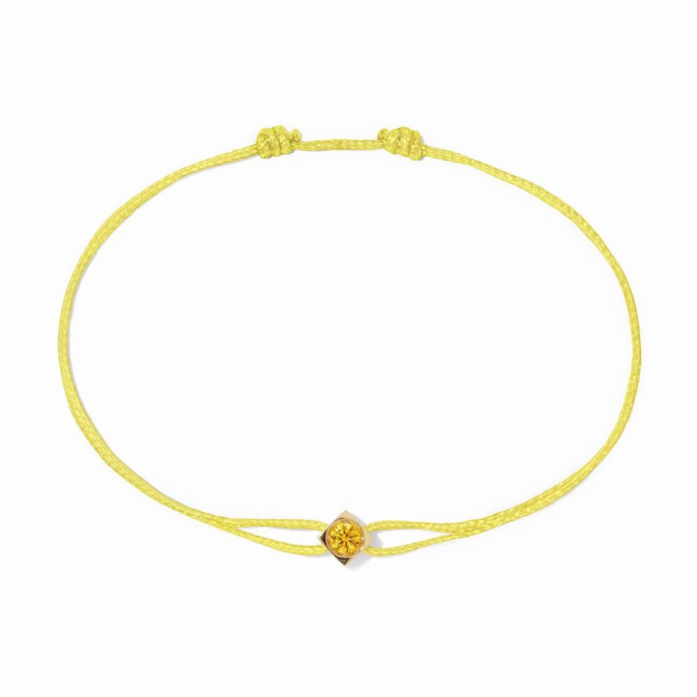 Le Cube yellow gold and yellow sapphire cord bracelet